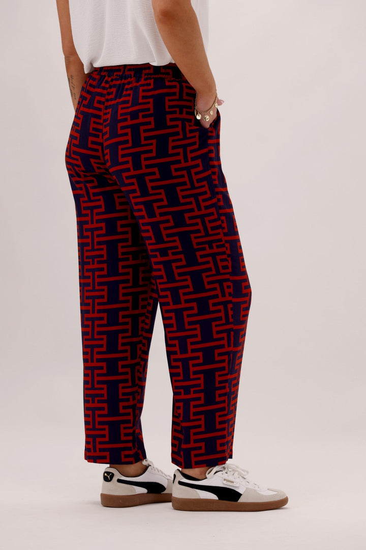 Gloss The Label Solstice Pant Navy Rust Geo Print
